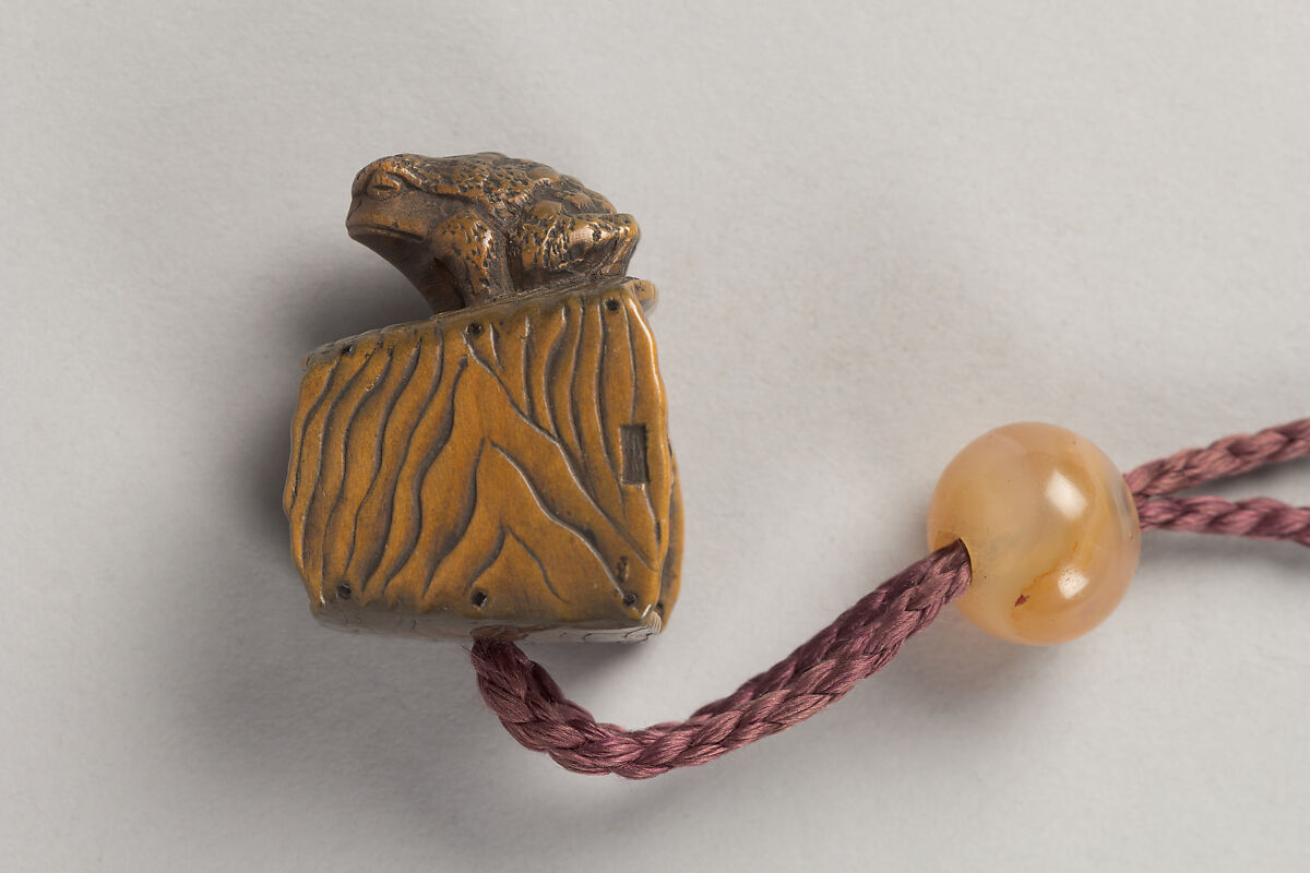 Case (Inrō) with Design of Chrysanthemums by a Stream, Sprinkled gold lacquer; Ojime: agate, Netsuke: carved wood frog on old bucket, Japan