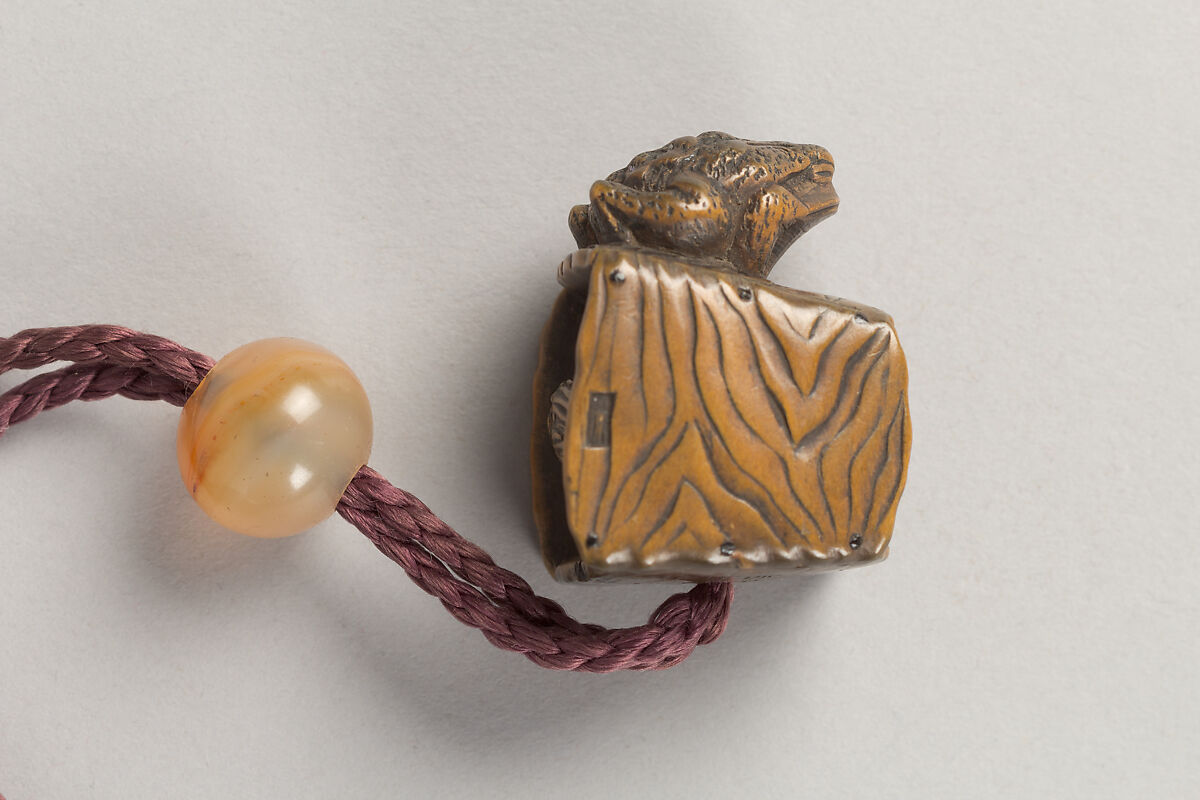 Case (Inrō) with Design of Chrysanthemums by a Stream, Sprinkled gold lacquer; Ojime: agate, Netsuke: carved wood frog on old bucket, Japan