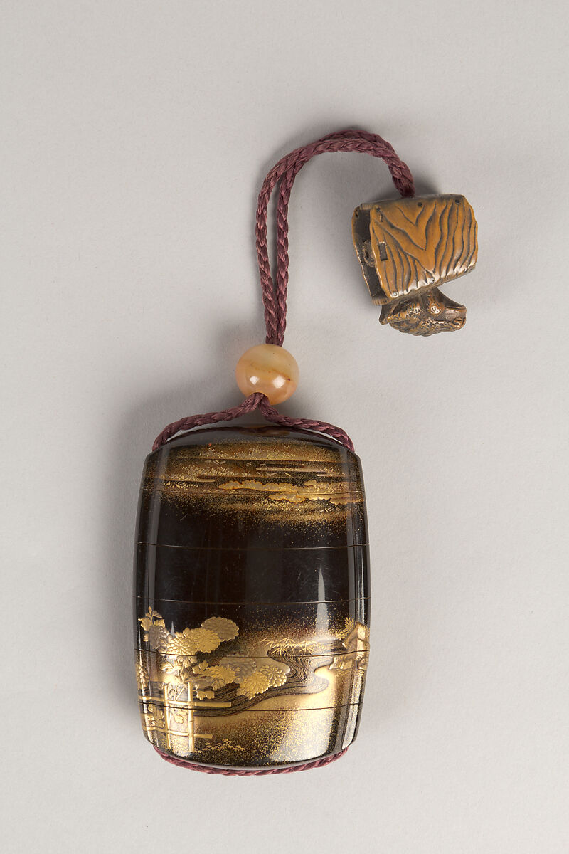Case (Inrō) with Design of Chrysanthemums by a Stream, Sprinkled gold lacquer; Ojime: agate, Netsuke: carved wood frog on old bucket, Japan 
