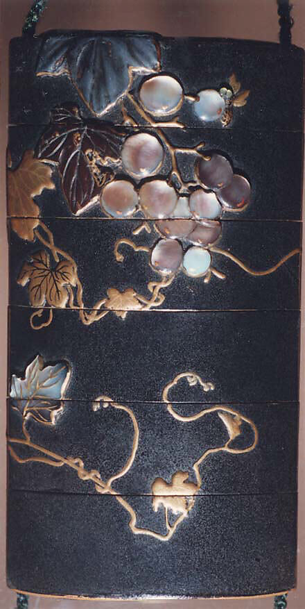 Case (Inrō) with Design of Grapevine, Case: gold and colored lacquer on black lacquer with mother-of-pearl and pewter inlays; Fastener (ojime): silver vase (signed: Tenni); Toggle: (netsuke): gold with design of cricket and dragonfly with autumn grasses, Japan