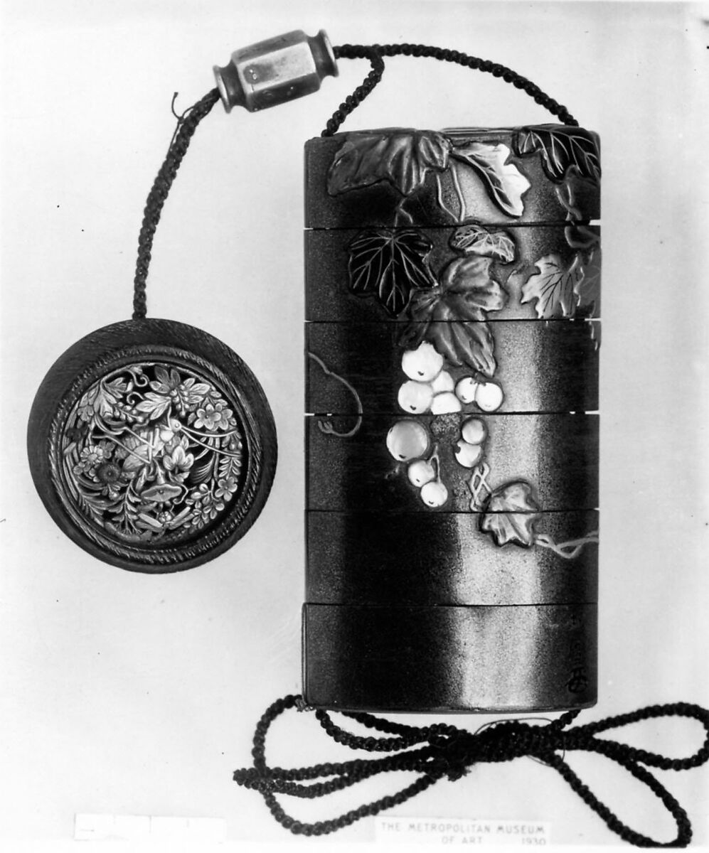 Case (Inrō) with Design of Grapevine, Case: gold and colored lacquer on black lacquer with mother-of-pearl and pewter inlays; Fastener (ojime): silver vase (signed: Tenni); Toggle: (netsuke): gold with design of cricket and dragonfly with autumn grasses, Japan