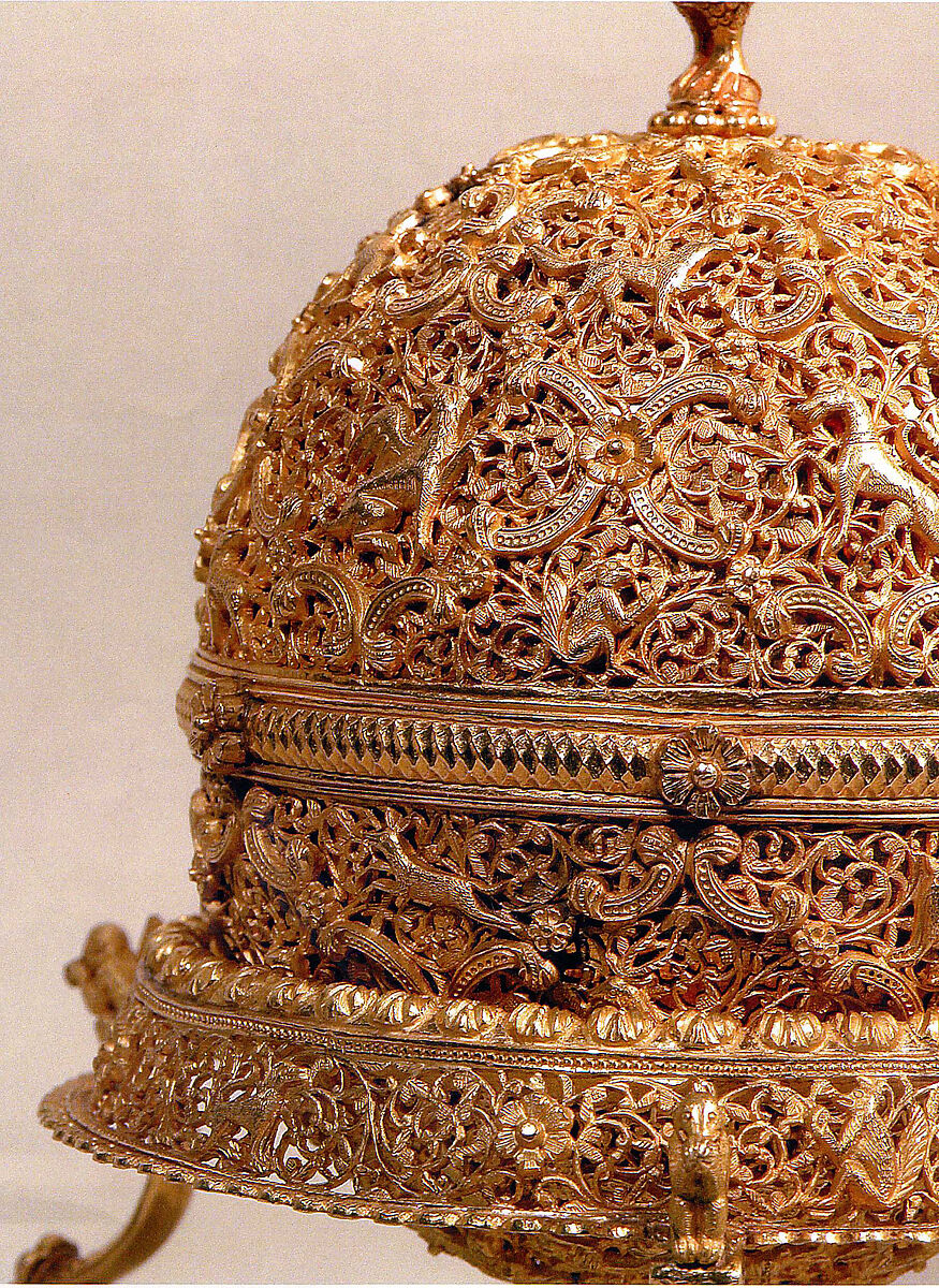 Goa Stone and Gold Case, Container: gold; pierced, repoussé, with cast legs and finials
Goa stone: compound of organic and inorganic materials
