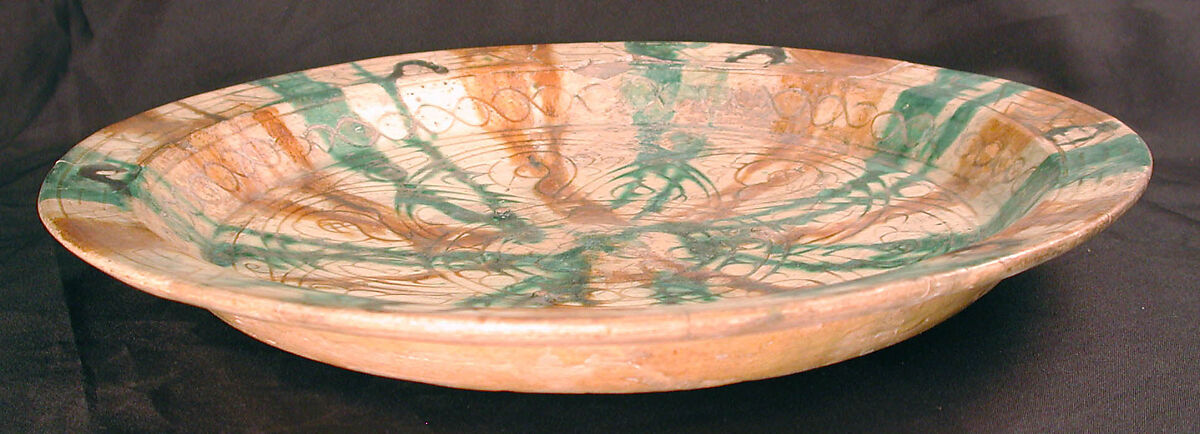 Plate, Earthenware; white slip, incised and glazed