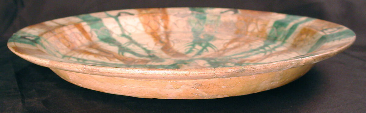 Plate, Earthenware; white slip, incised and glazed