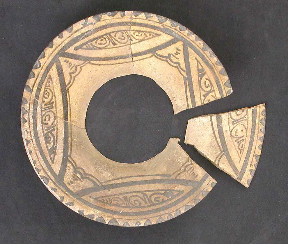 Fragment of a Bowl, Earthenware; underglaze painted in brown slip under transparent glaze 