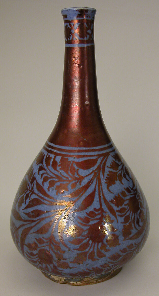Bottle, Stonepaste; luster-painted on opaque blue glaze under transparent colorless glaze 