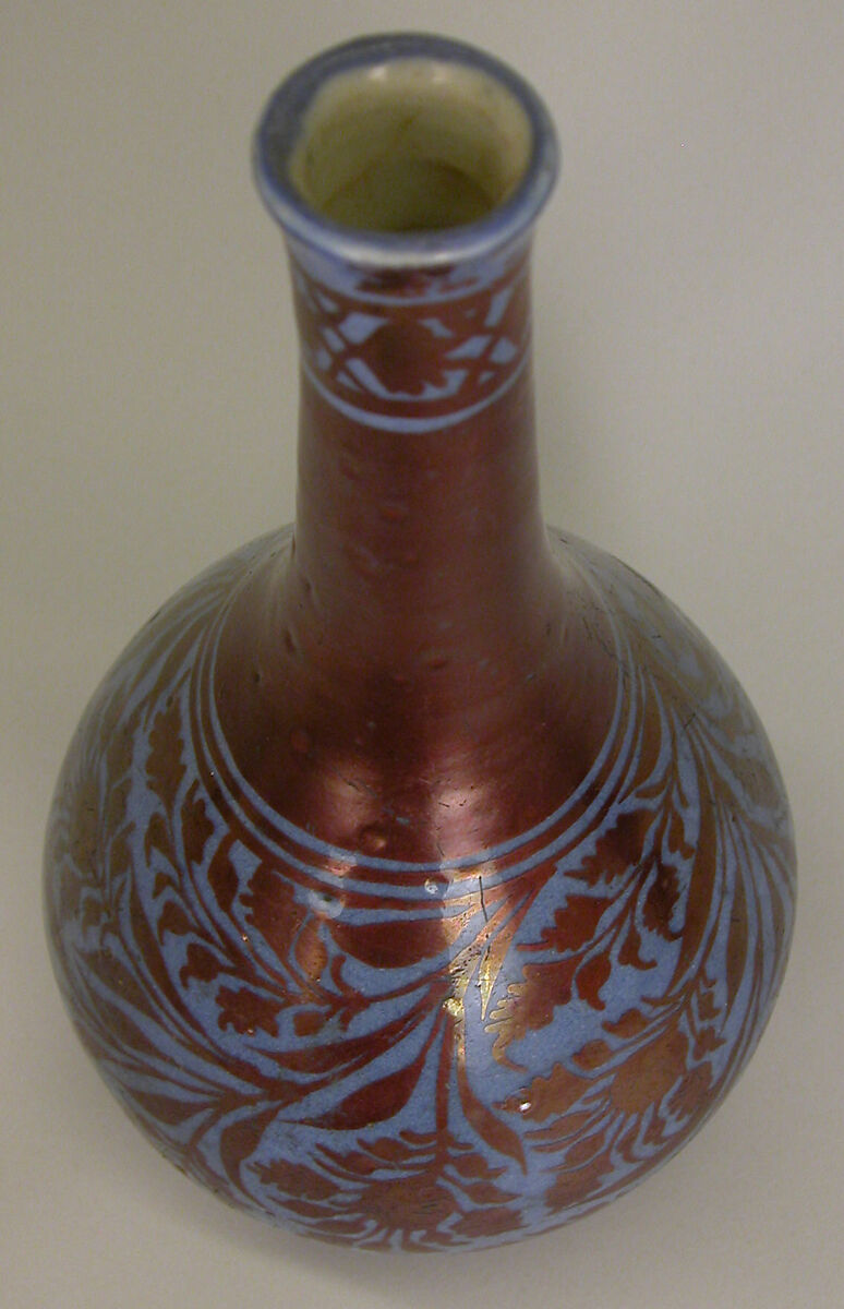 Bottle, Stonepaste; luster-painted on opaque blue glaze under transparent colorless glaze
