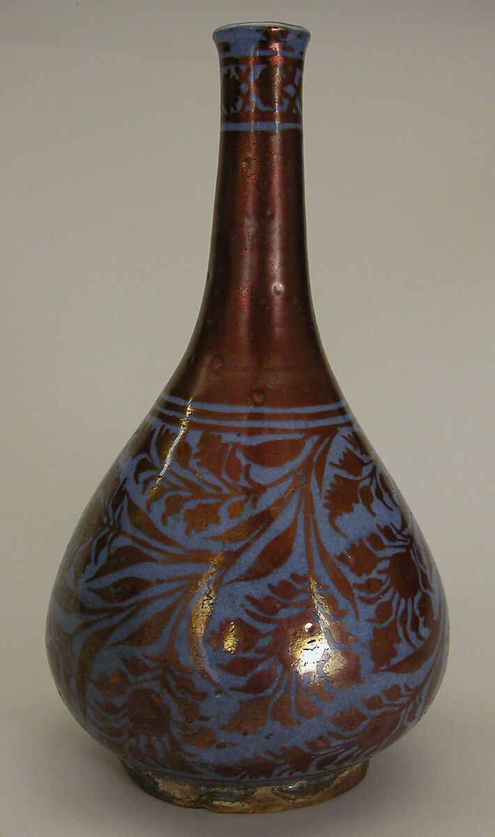 Bottle, Stonepaste; luster-painted on opaque blue glaze under transparent colorless glaze