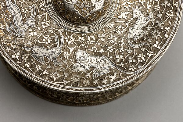 Silver Box with Animals in a Scrolling Vine, Chased and worked silver with niello-type inlay