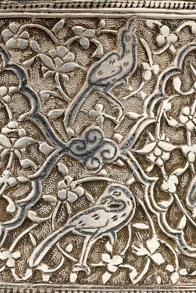Silver Box with Animals in a Scrolling Vine, Chased and worked silver with niello-type inlay