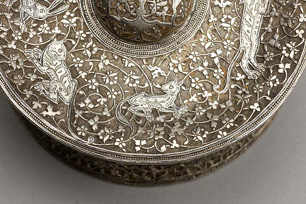 Silver Box with Animals in a Scrolling Vine, Chased and worked silver with niello-type inlay