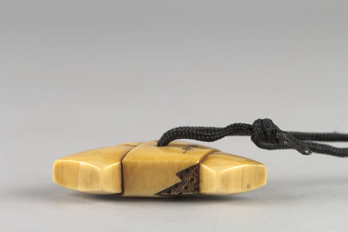 Netsuke Carved in Shape of Folded Letter on Paper Decorated with Court Motifs, Ivory, Japan