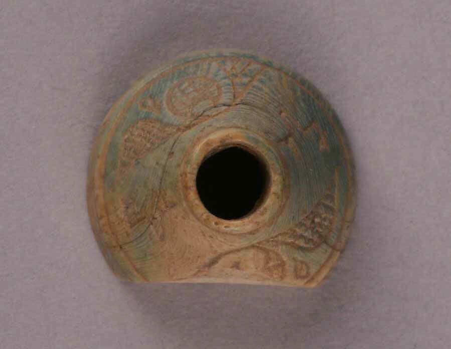 Spindle Whorl, Bone; tinted, incised, and inlaid with paint 