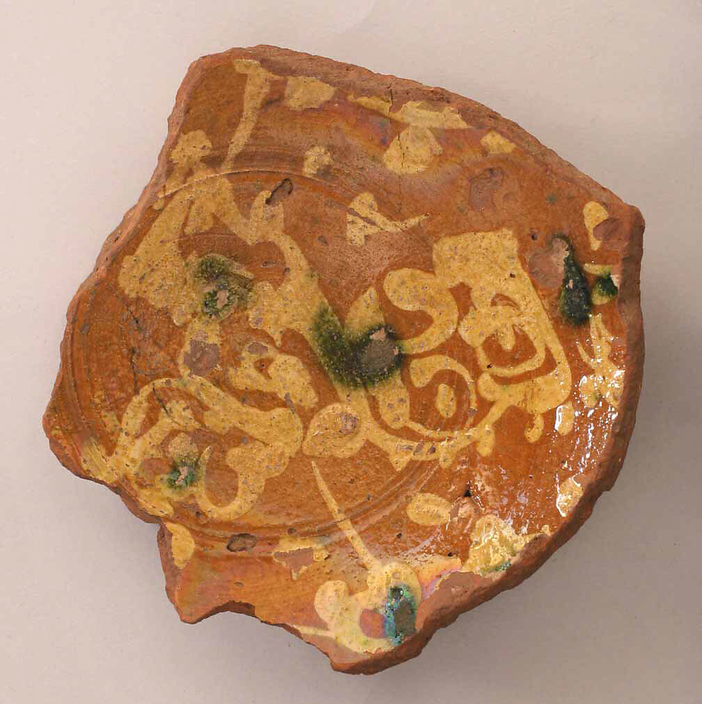 Fragment of a Bowl, Earthenware; slip-painted under transparent glaze 