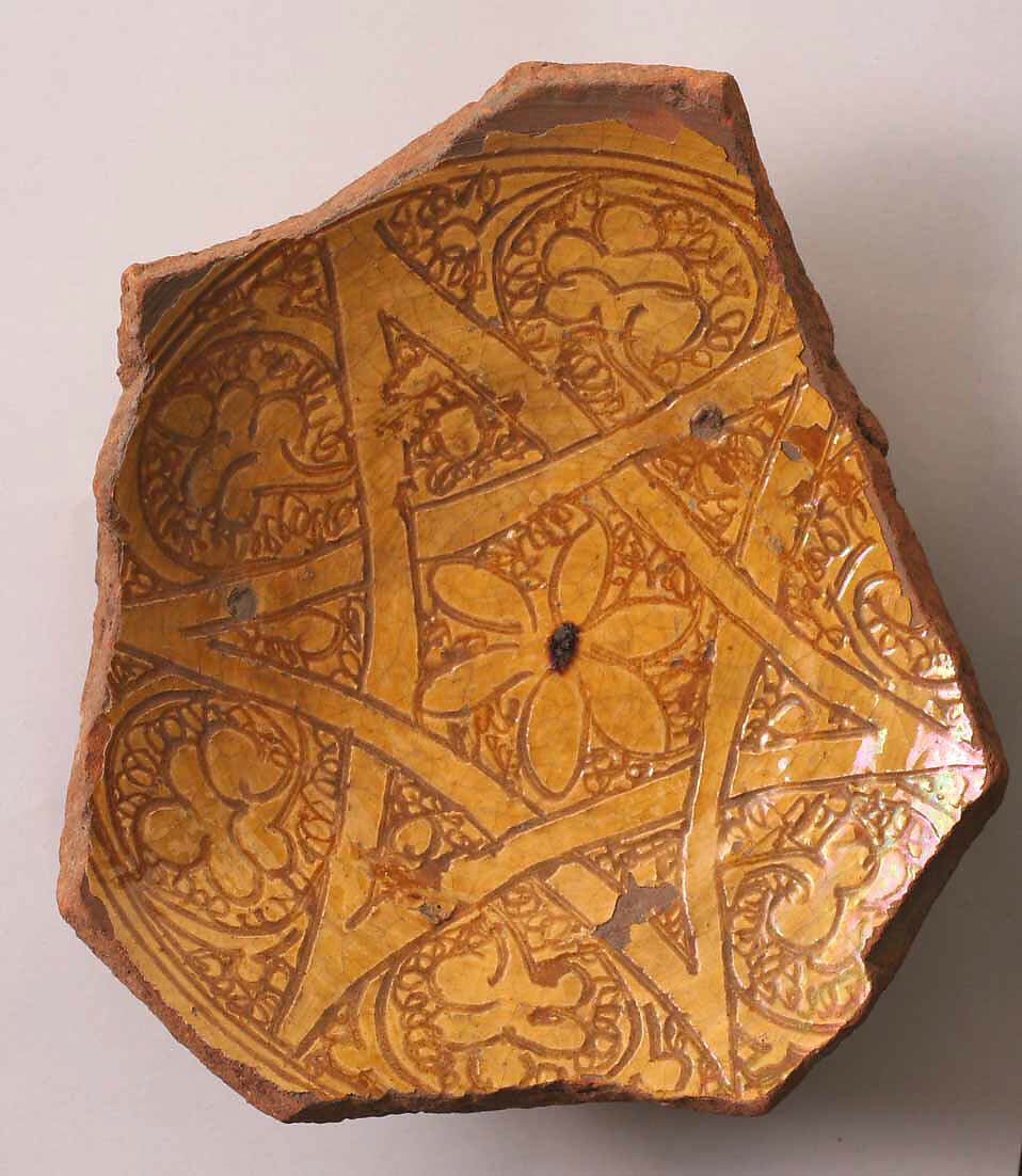Fragment of a Bowl, Earthenware; incised decoration through white slip and coloring under transparent glaze. 
