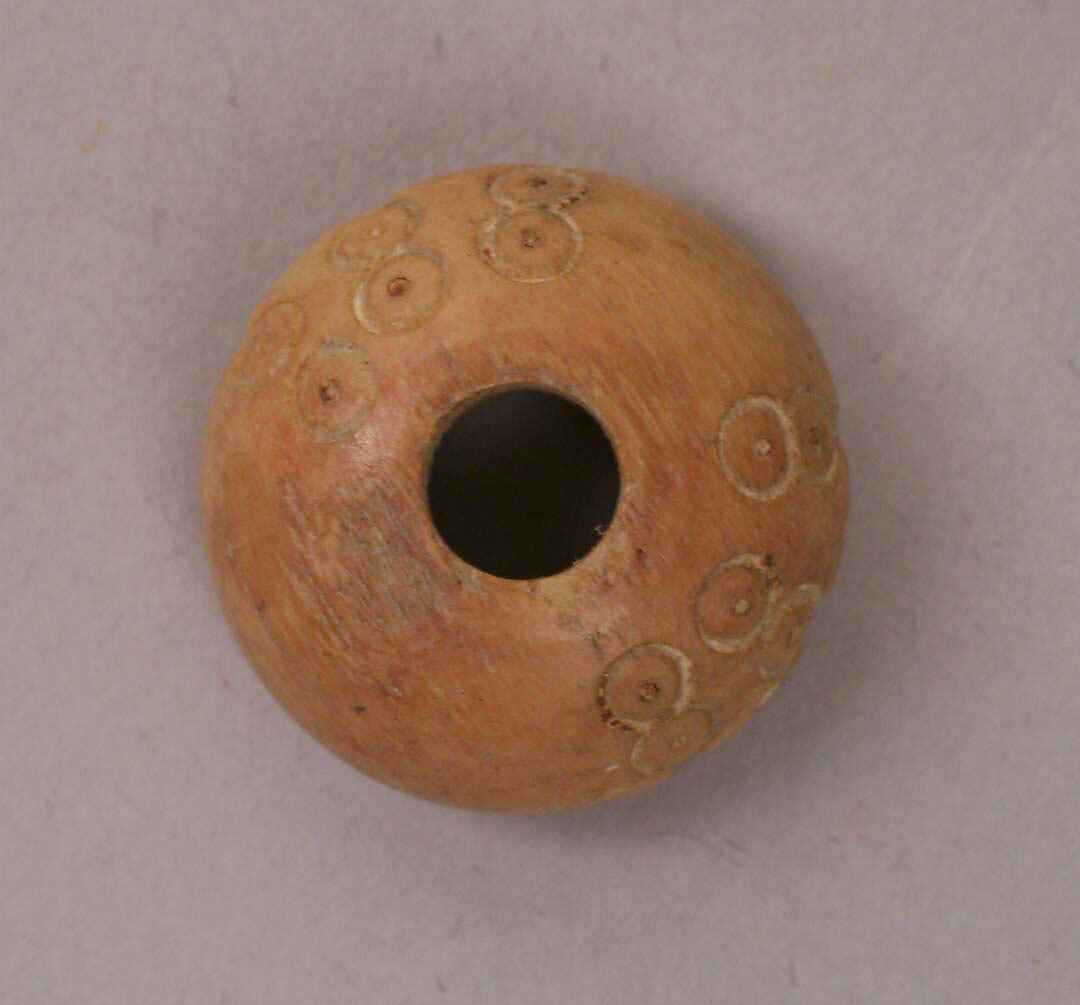 Button or Bead, Bone; tinted, incised, and inlaid with paint 