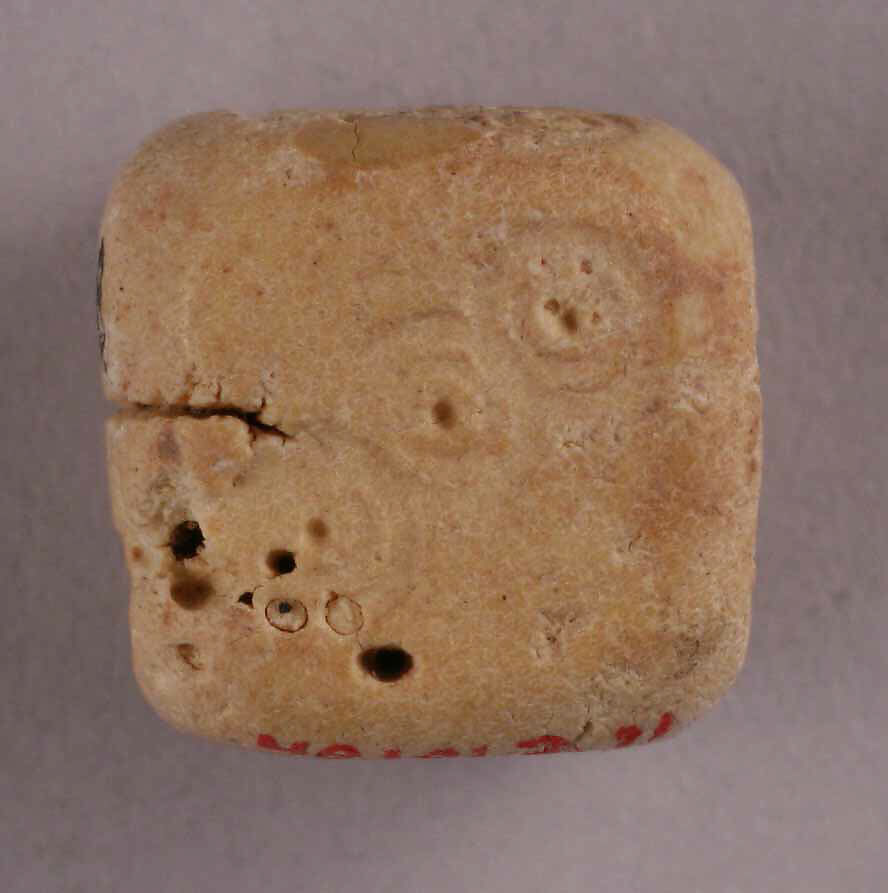 Dice, Bone; incised and inlaid with paint