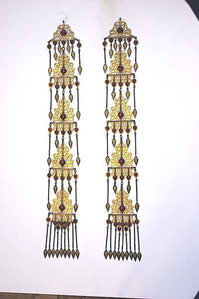 Long Temple Pendant, One of a Pair, Silver; fire-gilded, with openwork, cabochon carnelians, silver chains, and embossed pendants.