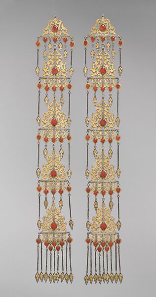 Long Temple Pendant, One of a Pair, Silver; fire-gilded, with openwork, cabochon carnelians, silver chains, and embossed pendants.