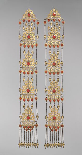 Long Temple Pendant, One of a Pair, Silver; fire-gilded, with openwork, cabochon carnelians, silver chains, and embossed pendants. 