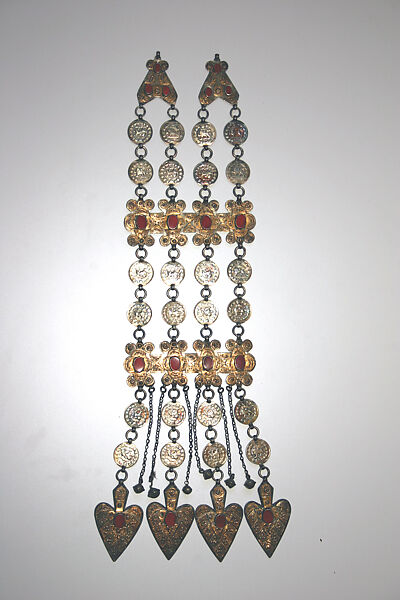 Dorsal Plait Ornament, Silver; fire-gilded, with stamped and applied decoration, Persian silver coins, table-cut carnelians, loop-in-loop chains, bells, and cordiform pendants