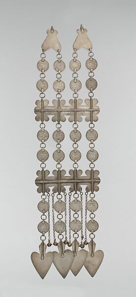 Dorsal Plait Ornament, Silver; fire-gilded, with stamped and applied decoration, Persian silver coins, table-cut carnelians, loop-in-loop chains, bells, and cordiform pendants