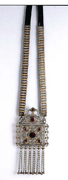 Amulet Holder, Silver and brass alloy; fire-gilded, with ram's-head terminals, loop-in-loop chains, bells, decorative wire, gilt-applied decoration, table-cut carnelians, and applique discs on leather