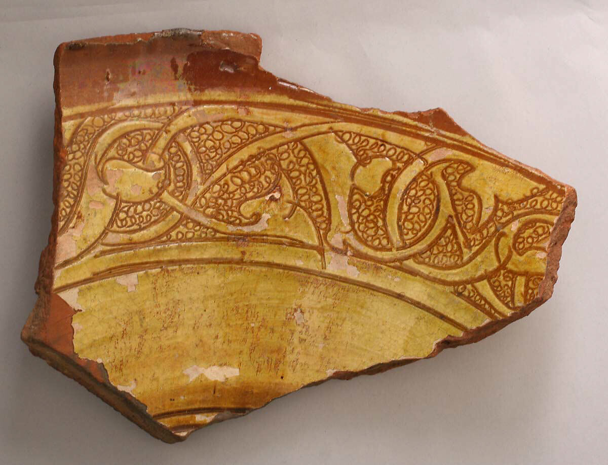 Fragment of a Dish, Earthenware; incised decoration through white slip and coloring under transparent glaze 