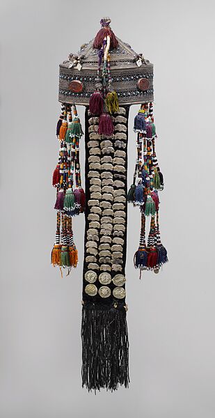 Crown, Silver, with decorative wire and stamped decoration, table-cut incised carnelians, turquoise, beads, openwork, and silver coins; quilted cotton lining, cotton cords and tassels with beads, and velvet strip with metal ornaments