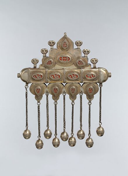 Triangular Amulet Holder, Silver with stamped beading, decorative wire, ram's-head terminals, glass inlays over red foil, lacquer, or cloth, wire chains, and spherical beads. 