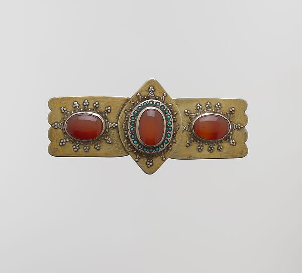 Belt Buckle, Silver; fire gilded with false granulation, slightly domed carnelians, and turquoise beads. 