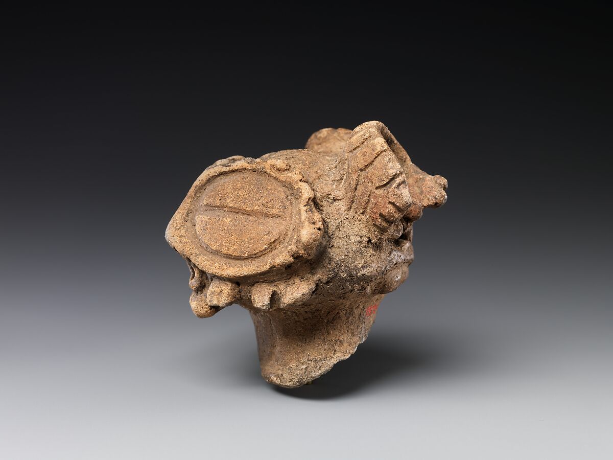 Head of a Clay Figure (Dogū), Earthenware with cord-marked and incised decoration, Japan