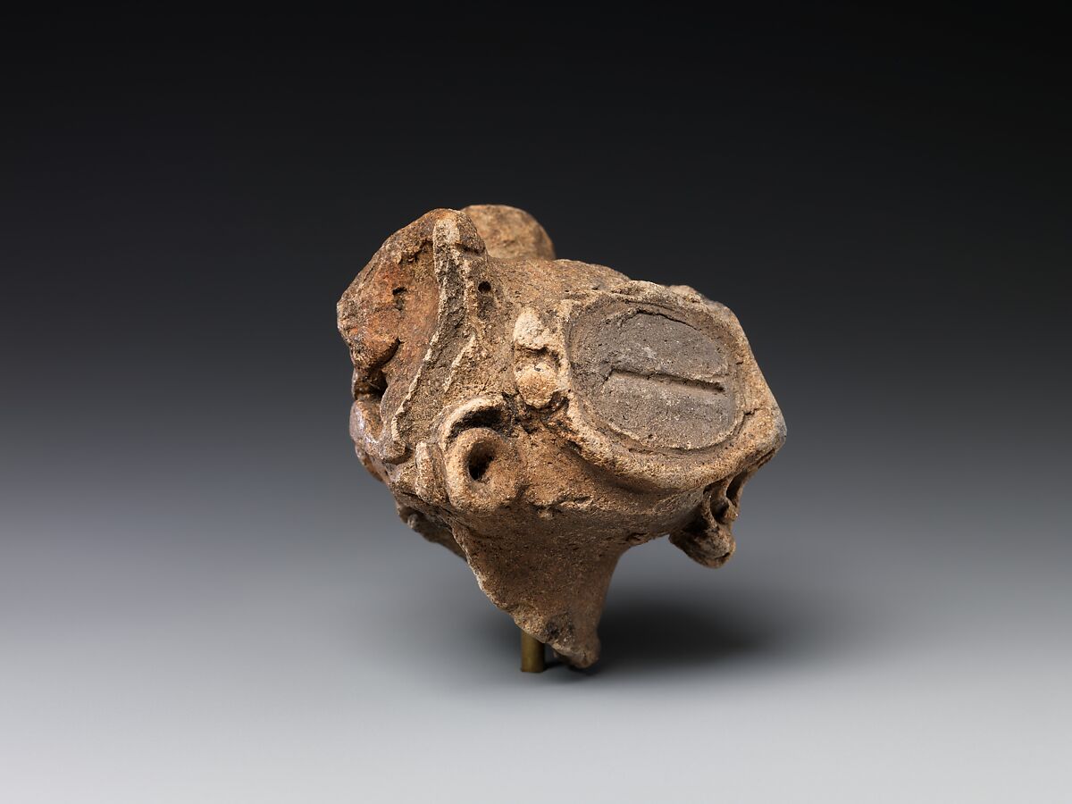 Head of a Clay Figure (Dogū), Earthenware with cord-marked and incised decoration, Japan