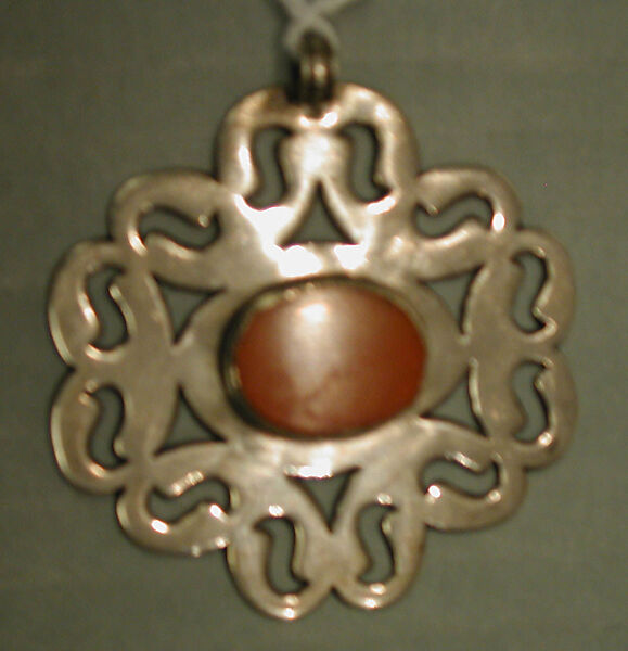 Pectoral Disc Ornament, Silver with openwork and table cut carnelian