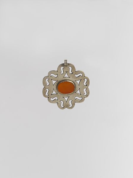 Pectoral Disc Ornament, Silver with openwork and table cut carnelian 