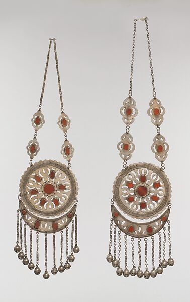 Pectoral Disc Ornament, One of a Pair, Silver; fire gilded with openwork decorations, table cut carnelians, silver twisted wire and link chains, and bells/beads 