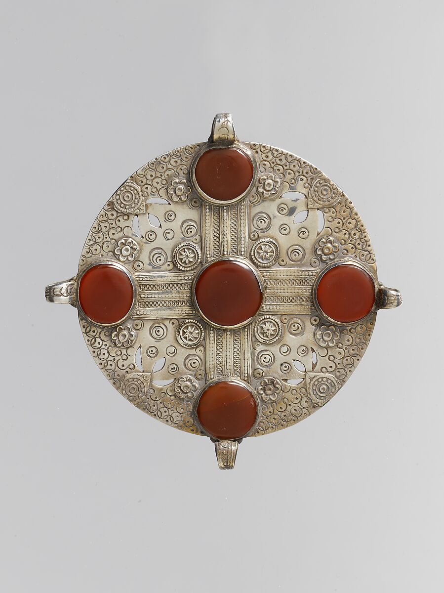 Pectoral Disc Ornament, Silver, chased, with applied and punched decoration, decorative wire, openwork, and table-cut carnelians 