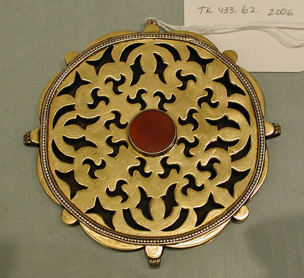 Pectoral Disc Ornament, Silver; fire gilded with openwork, decorative wire, and table cut carnelian