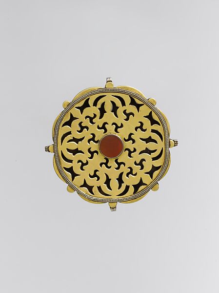 Pectoral Disc Ornament, Silver; fire gilded with openwork, decorative wire, and table cut carnelian 