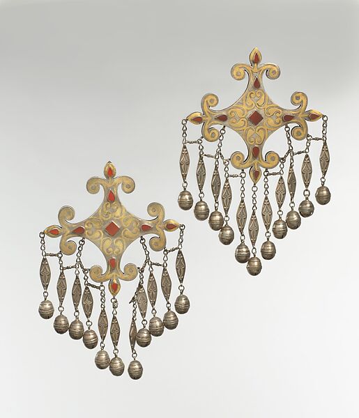 Pectoral Disc Ornament, One of a Pair, Silver; fire-gilded with stamped bead and twisted wired decoration, engraving/punching and openwork decoration and table cut carnelian
