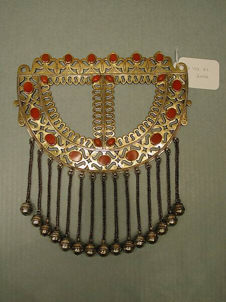 Pectoral Ornament, Silver; fire-gilded with openwork and beaded wire decoration, silver twisted wire chains with spherical bells/beads and table cut carnelians