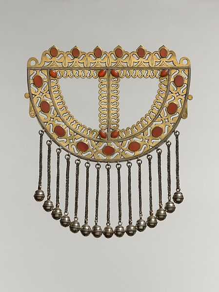 Pectoral Ornament, Silver; fire-gilded with openwork and beaded wire decoration, silver twisted wire chains with spherical bells/beads and table cut carnelians 