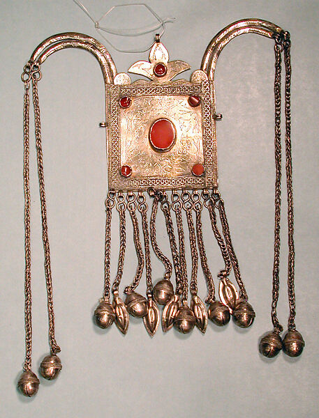 Boy's Amulet, Silver; fire gilded, with decorative wire, wire chains, bells, embossed pendants, and table cut carnelians