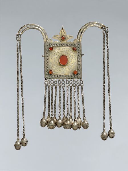 Boy's Amulet, Silver; fire gilded, with decorative wire, wire chains, bells, embossed pendants, and table cut carnelians 