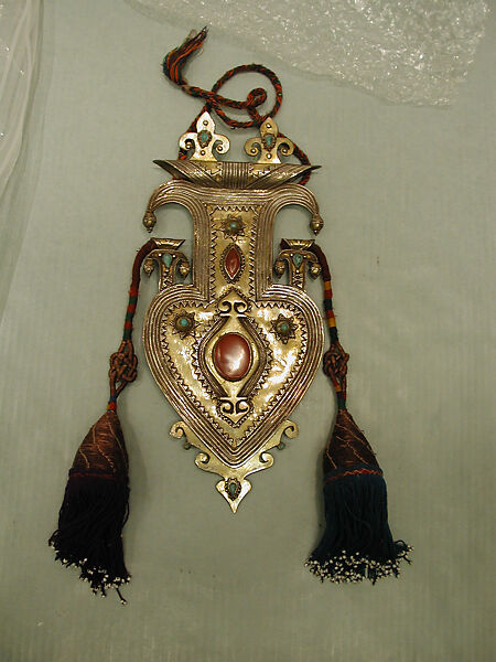 Cordiform Pendant with Tassles, Silver; fire-gilded, with silver shot, decorative wire, cabochon and table-cut carnelians, slightly domed turquoises, and wool tassels