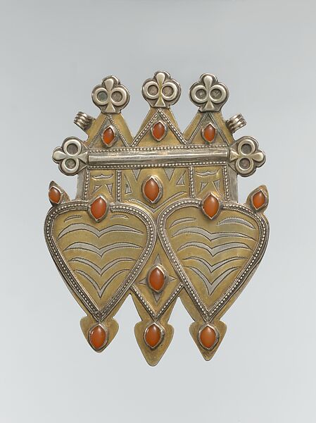 Double Cordiform Pendant, Silver; fire-gilded and chased, with decorative wire and stamping, ram's-head terminals, and cabochon carnelians 