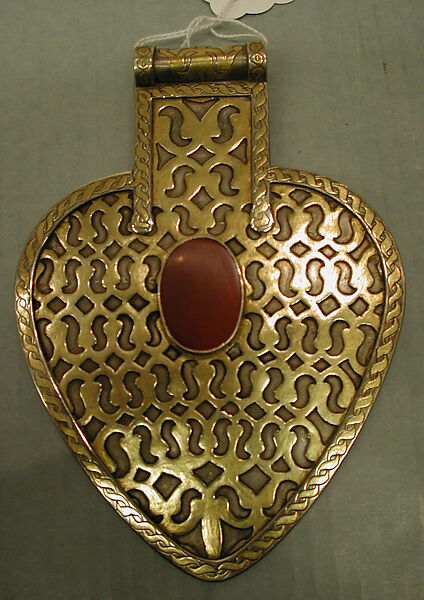 Detached Cordiform Pendant, One of a Pair, Silver; fire-gilded and chased, with openwork and table-cut carnelians 
