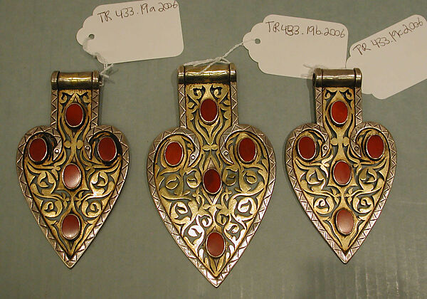 Group of Three Detached Cordiform Pendants, Silver; fire-gilded and chased, with openwork  and table-cut carnelians