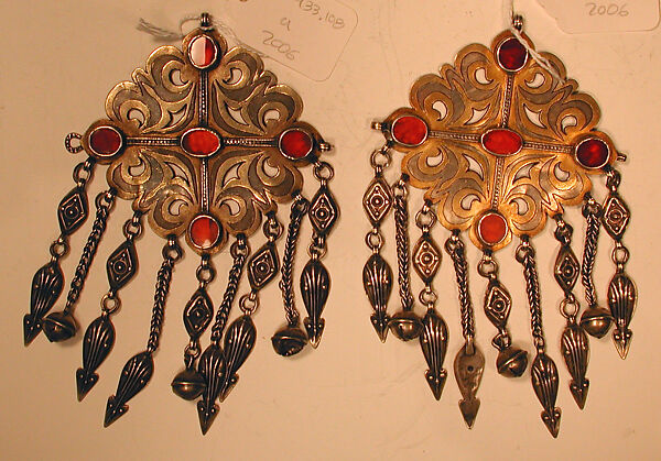 Pair of Floral Pectoral Ornaments, Silver, fire gilded and engraved/punched, stamped and bead decoration with openwork, twisted silver wire chains and pendants with appliques, table cut carnelians and turquoise beads