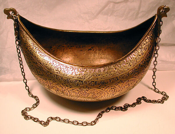 Begging Bowl, Brass; chased with floral and animal-motif decorations; dragon’s-head finials are probably later replacements